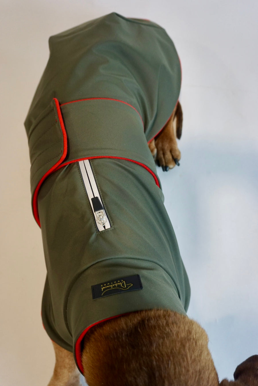 Green Parka Da Vinci with red fleece lining