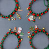 Green and red Christmas necklaces with Emaille pendants